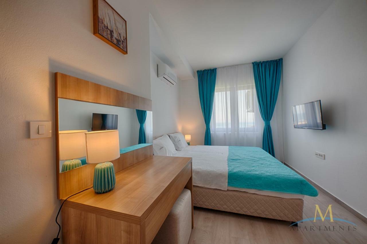 M Apartman